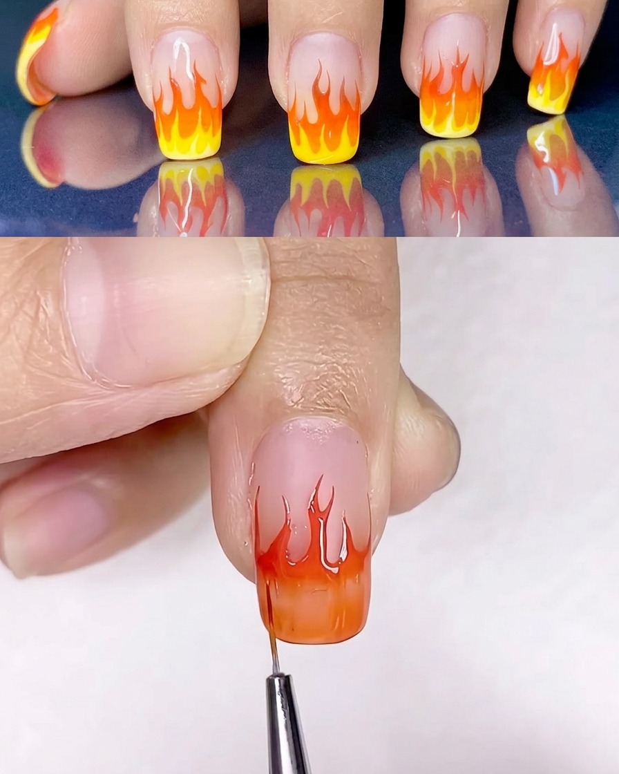 Ein flacher Pinsel verblendet gelben und orangen Gellack auf der Nageloberfläche.