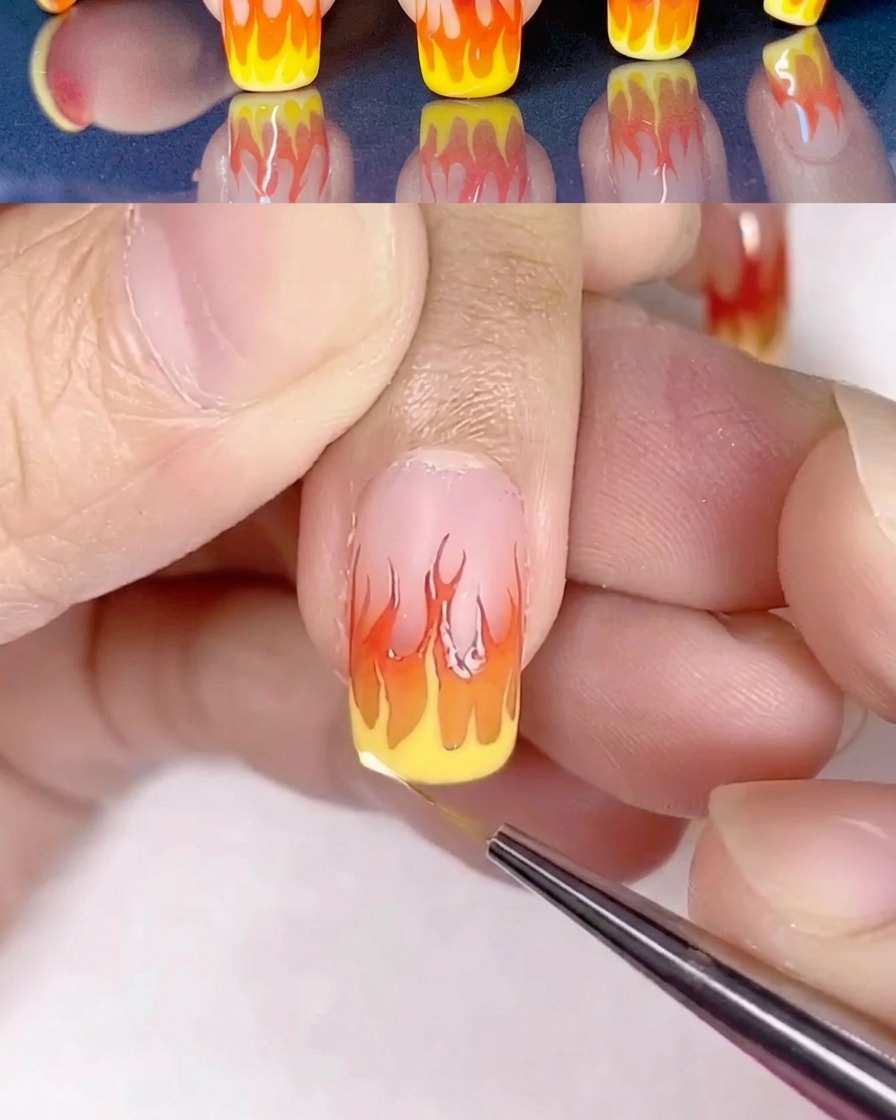Detailreiche Flammen-Nailart mit zusätzlichen hellgelben Highlights.