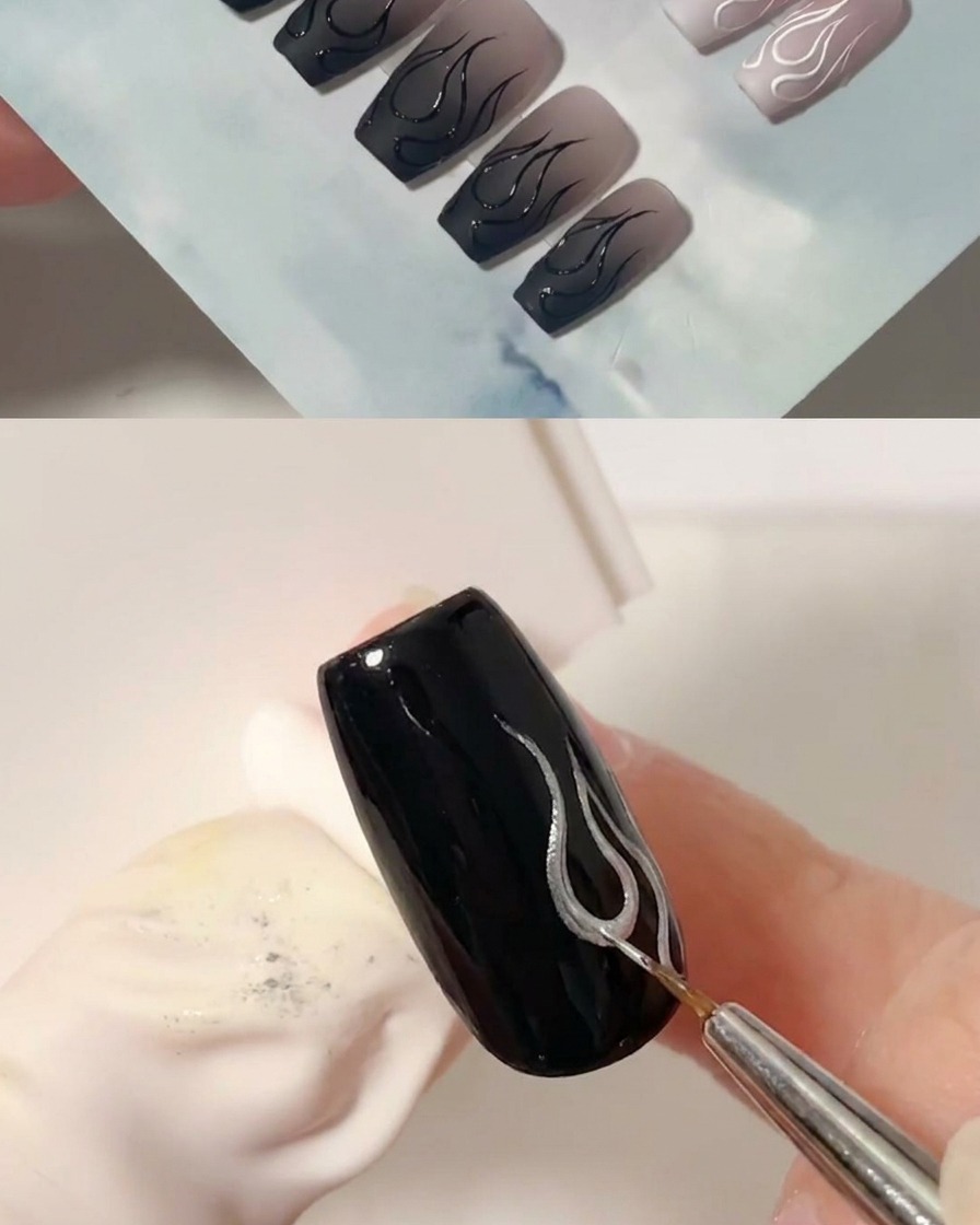 Ein feiner Liner-Pinsel fügt eine zweite geschwungene schwarze Linie hinzu, um die rechte Seite des Flammendesigns zu bilden.