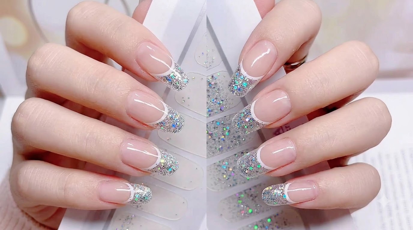 Raffinierte Silberglitter-Gradient-Nagelsticker mit transparenter Nude-Basis und dicht glitzernden Spitzen in Hochglanz-Ausführung.